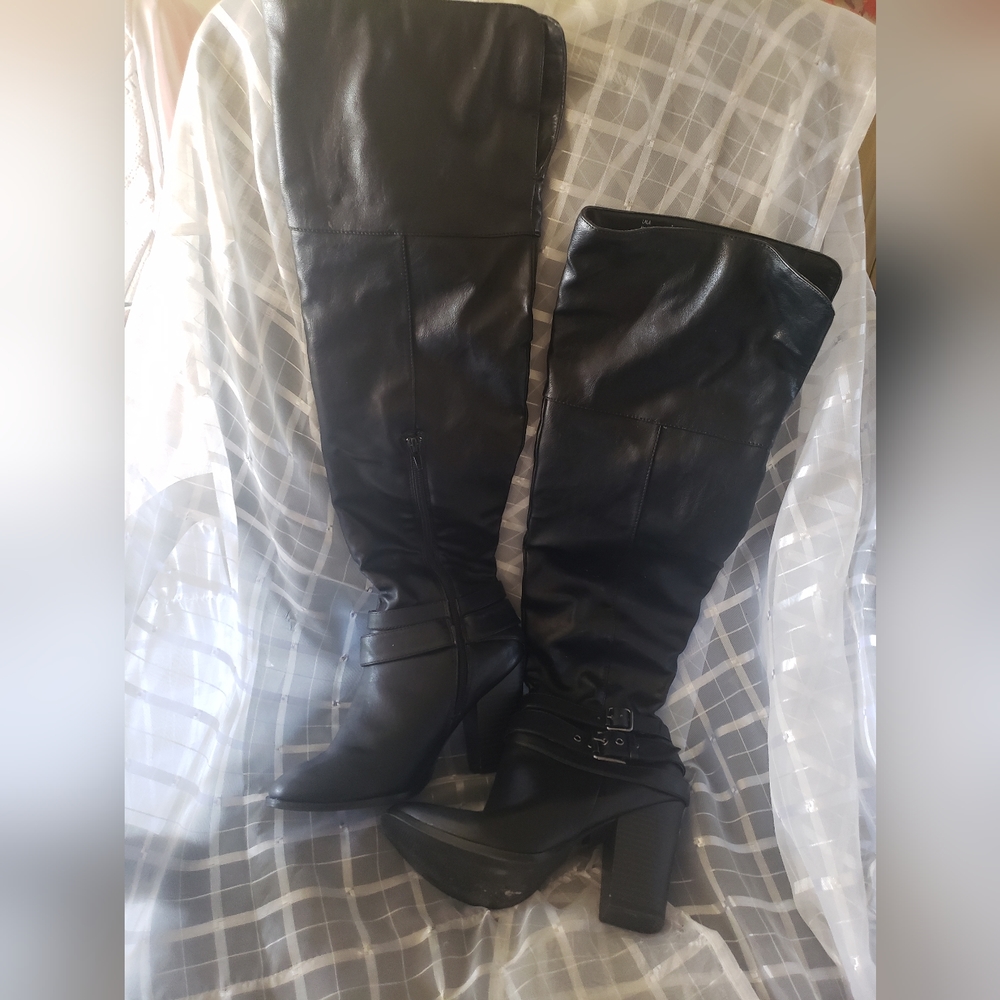 Theigh high boots